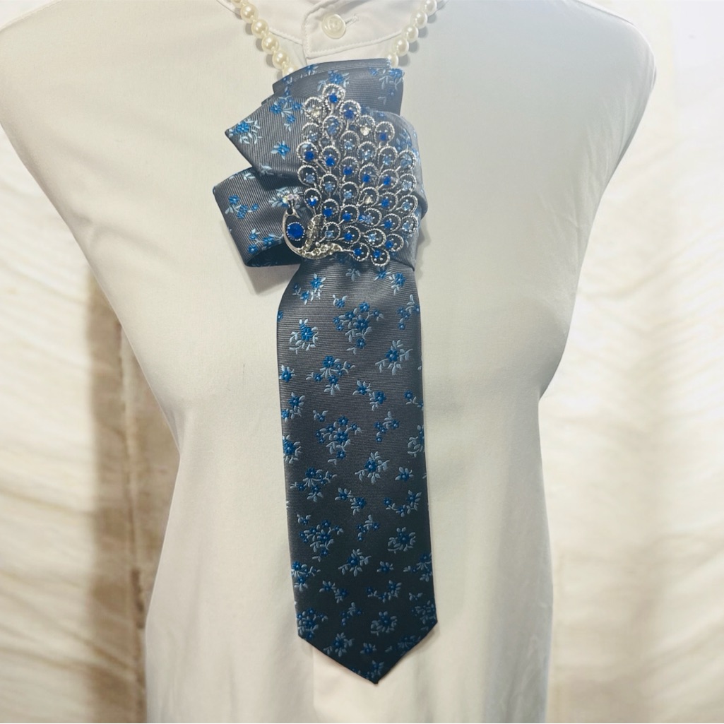 George Blue And Silver Floral Necktie With Peacock Brooch